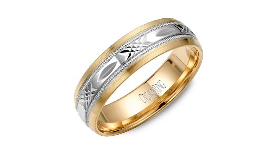 a men’s wedding band featuring mixed metals and intricate details a men’s wedding band featuring mixed metals and intricate details