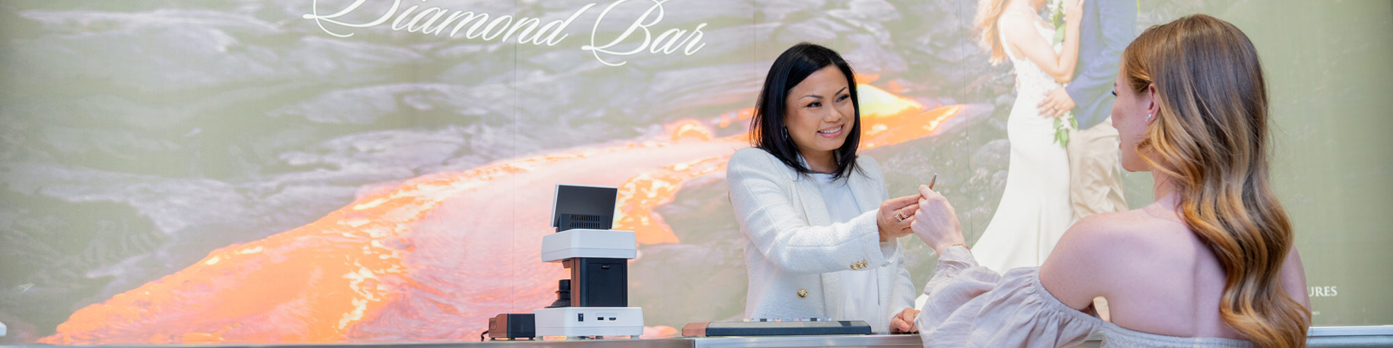 Sales associate helping customer Sales associate helping customer