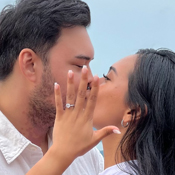 Woman looking happily at jewelry box Woman looking happily at jewelry box