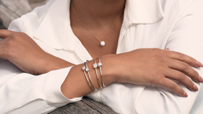 American Grown cropped photo of woman with jewelry on