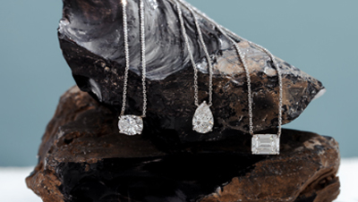 GIA Certified necklaces on rock