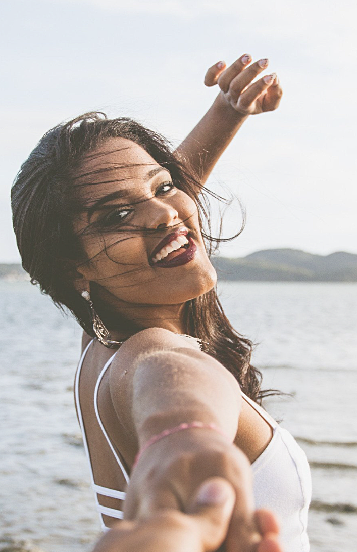 Woman Smiling at the Beach Woman Smiling at the Beach